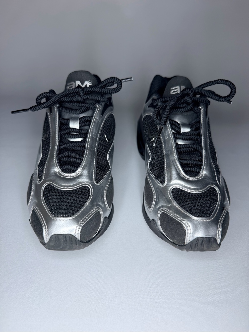 Nike Women's Black and Metallic Silver Athletic Sneakers